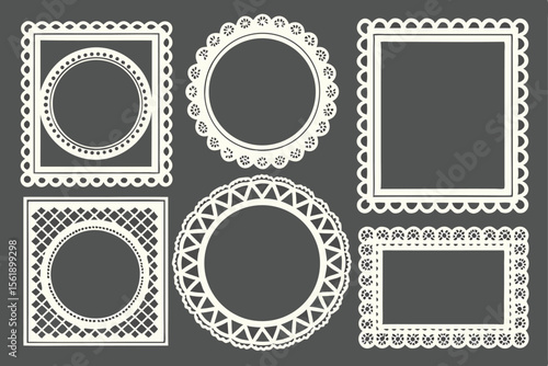 Collection of six ornate white paper cutout frames and borders on a dark background