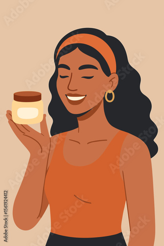 Happy smiling woman holding a jar of beauty cream. Skincare routine, self-care, cosmetology concept. Beautiful girl with dark skin presents a cosmetic product with blank label mockup.