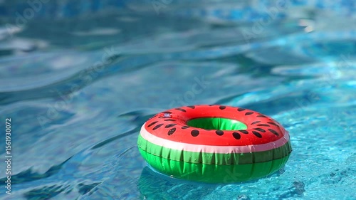 Watermelon float drifting on water