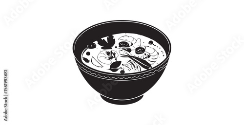 Delicious tom yum goong soup with shrimp and herbs in a black bowl silhouette
