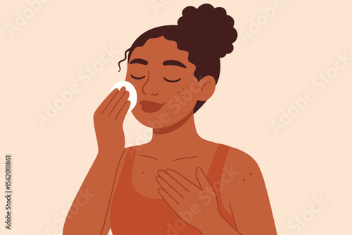 Black woman cleaning her face with a cotton pad. Skincare routine concept. African American girl removing makeup with a cleanser or toner. Beauty and self-care flat vector illustration.
