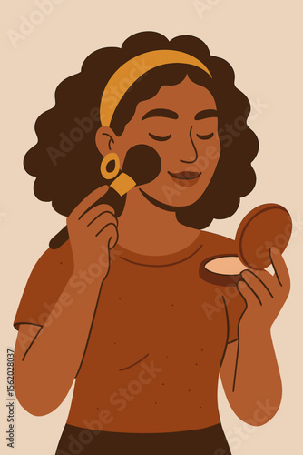 Beautiful African American woman applying makeup powder with a cosmetic brush. Happy young black girl doing her morning beauty routine. Self-care, cosmetics, skincare and lifestyle concept.