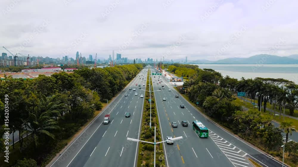 Explore shenzhen binhai avenue's coastal scenery and city traffic flow in stunning aerial views Explore shenzhen binhai avenue's coastal scenery and city traffic flow in stunning aerial views
