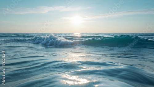 Fototapeta Naklejka Na Ścianę i Meble -  Ocean waves sea water beach sky blue sun sunlight seascape nature horizon ripple serene calm beautiful