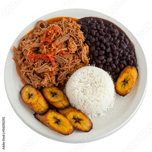 Delicious ropa vieja plate with plantains, rice, and black beans