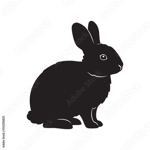 A black silhouette of a rabbit sitting and looking to the right isolated on white background silhouette