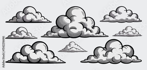 Collection of hand drawn cumulus clouds in black and white sketch style