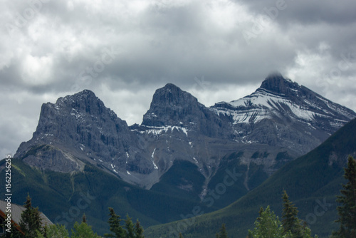 Wallpaper Mural The Three Sisters Mountain Range on a Cloudy Day, Canmore, AB, Canada Torontodigital.ca