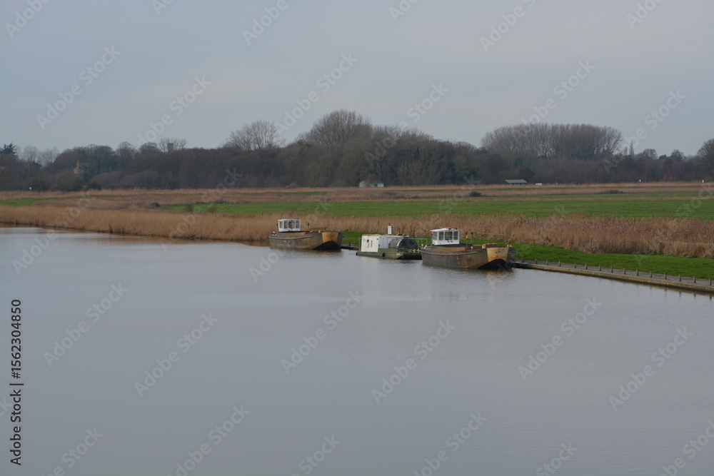 Fototapeta premium A scenic landscape view of boats on the river