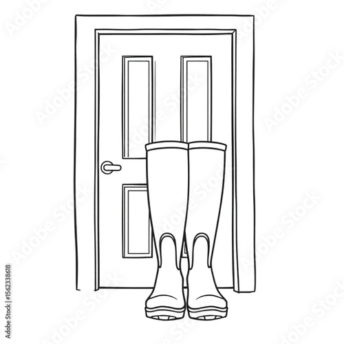 A pair of wellington boots by a back door