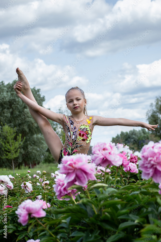 gymnast on a field with flowers gymnast on a field with flowers
