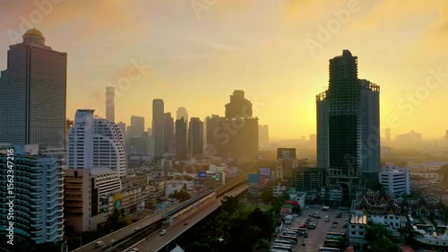 Wallpaper Mural The sun rises over the bangkok skyline, illuminating the modern buildings Torontodigital.ca