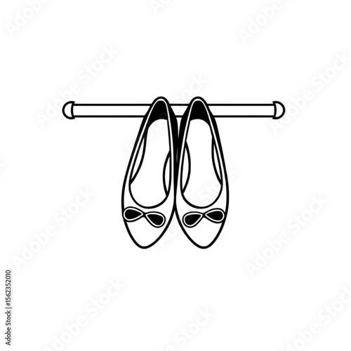 A pair of ballet flats on a shoe rack