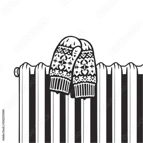 A pair of woollen mittens on a radiator