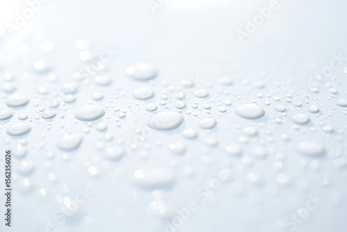 Wallpaper Mural Pure Water Droplets on a Smooth Surface Macro Photography of Clean Water Beads Torontodigital.ca