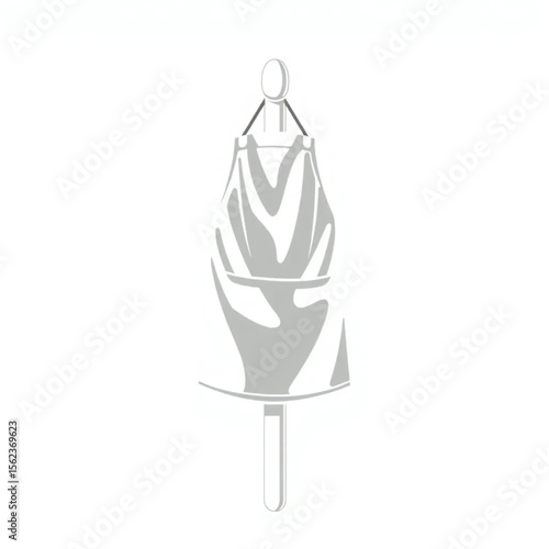 A linen apron on a kitchen peg