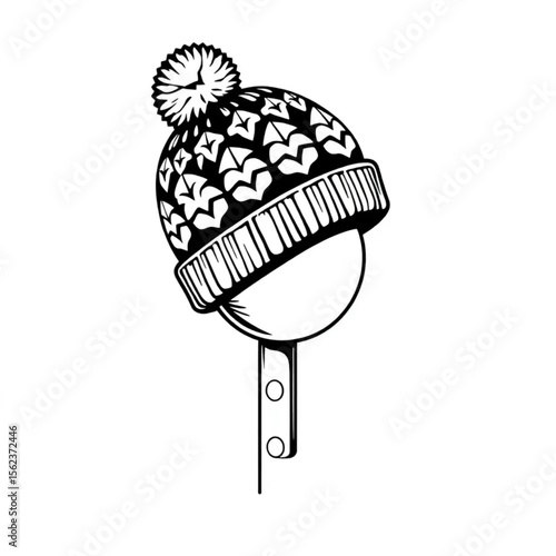 A woollen hat on a coat peg