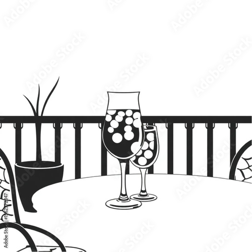 A glass pitcher of sangria on a terrace table