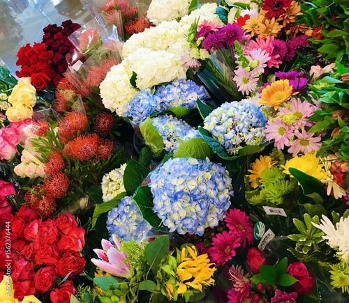 Fresh hydrangeas, roses, and mixed bouquets in bloom