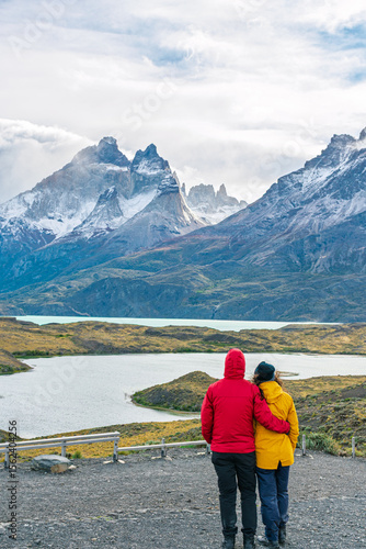 Couple view Torres del Paine. Mountains, lake, Patagonia, Chile.
