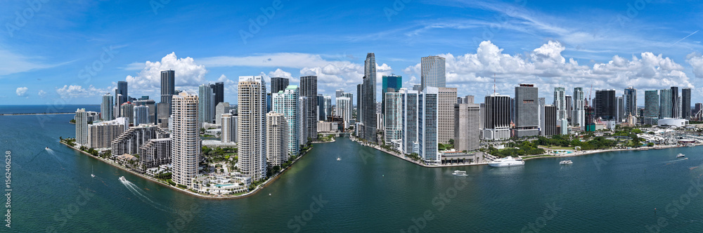 Obraz premium Panorama of Brickell in Miami. Panorama of Miami skyline on a sunny day. Panorama view of Miami Beach and Brickell. Brickell famous panorama. Miami downtown landscape.