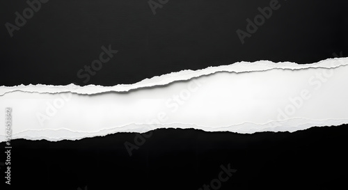 Torn black paper revealing a white strip, creating a textured background.