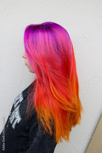 Vibrant Gradient Dyed Hair in Pink, Purple, and Orange Colors