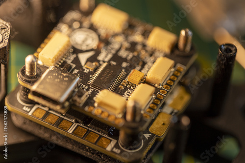 Close-up view of FPV drone flight controller circuit board with connectors