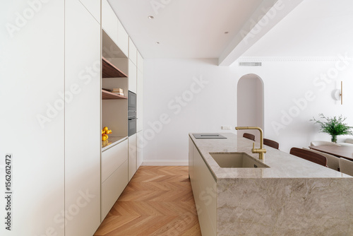 Marble kitchen island and sleek cabinetry design