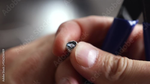 Cutting and revealing the internal structure of a coaxial cable — multiple cuts to show its layered composition