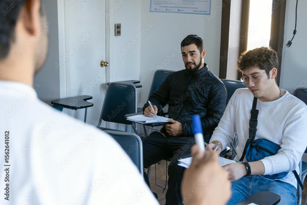 Fototapeta premium Teacher explaining lesson in front of class