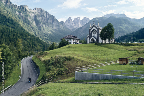 Dolomite landscape with Church and Motorcycle