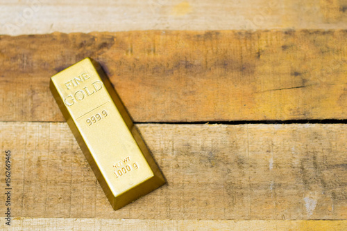 Golden Bar on Rustic Wood