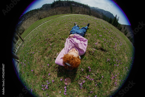 Portrait of a relaxing guy on a fisheye lens