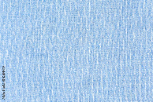 Close-up of a light blue linen fabric texture