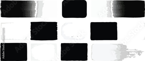 Abstract checkerboard pattern with rough brush strokes and gradient fills in black and white representing texture and contrast
