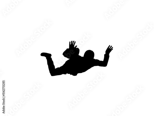 Silhouette of a skydiver in freefall, arms and legs outstretched.