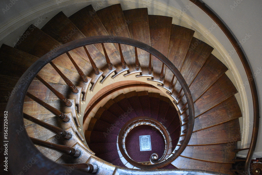 Fototapeta premium spiral staircase in a old house