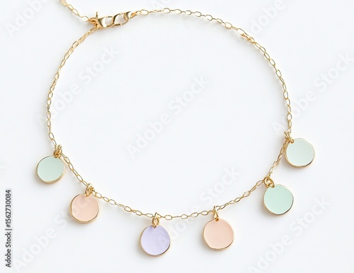 Wallpaper Mural Delicate pastel-colored circle charms dangle from a gold chain anklet Torontodigital.ca