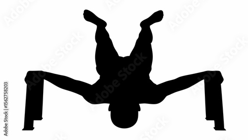 Silhouette of a person performing a handstand with feet up and hands on parallettes exercise equipment