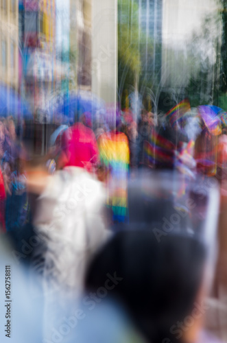 portrait shot of gathering of people at lgbt pride march at bogotá colombia taken at slow shutter speed