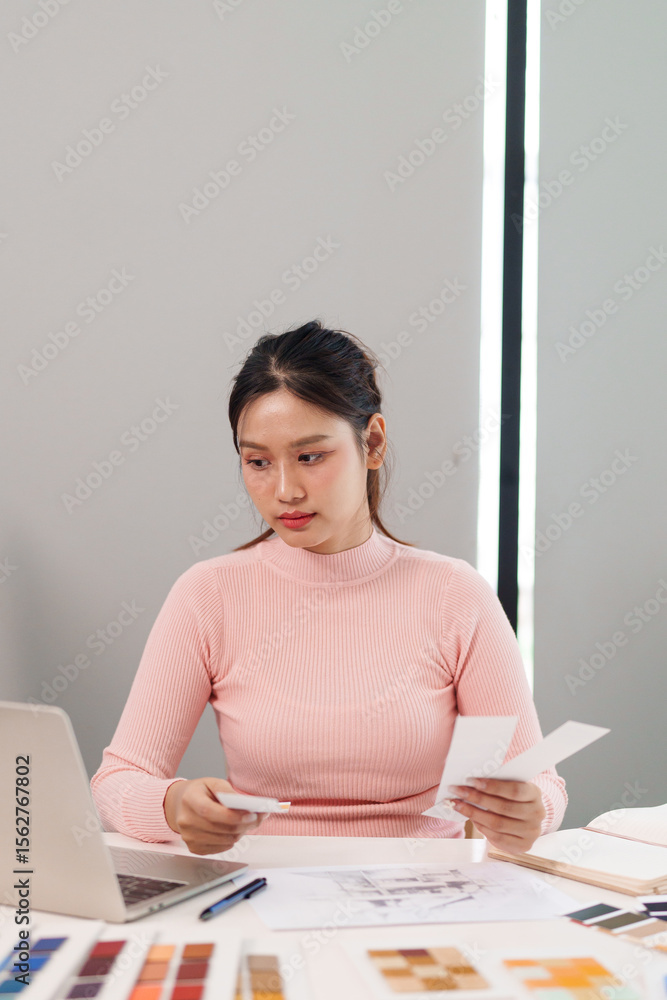 Obraz premium Asian Young Woman UI UX Designer Working at Desk With Laptop Creative Design Inspiration User Interface Project Design Workplace