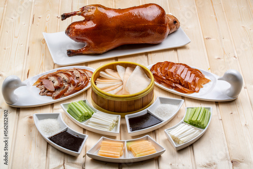 Peking duck on wooden board in sauna