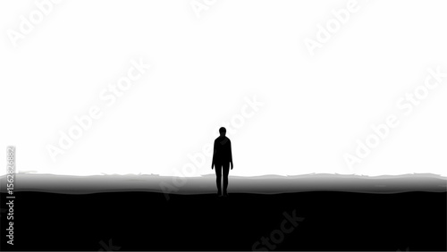 Silhouette of a person standing alone in a monochrome landscape under a bright white sky landscape view