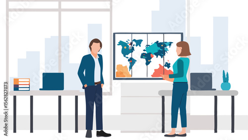 Two people discussing a world map in an office setting with desks and laptops near a large window