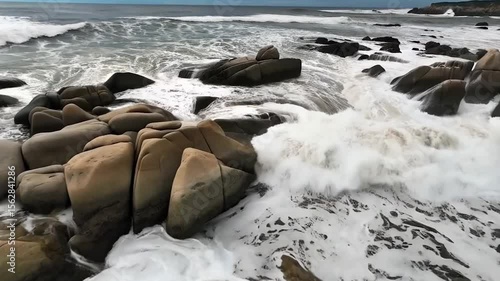 Ocean waves crashing over rocks