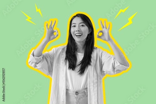 Happy young Asian woman sho...