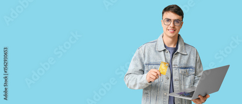 Young man with credit card ...