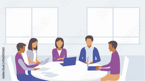 Group of people sitting around a table with laptops in a brightly lit room with large windows