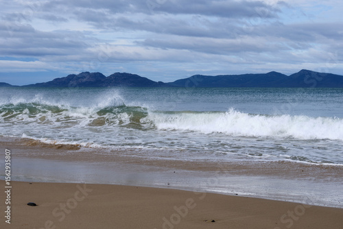 Sea splash on a shallow beach - Swansea, Tasmania, Australia
